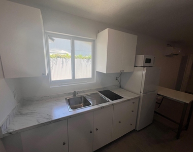 1244 W 27th Street - Photo Thumbnail 1
