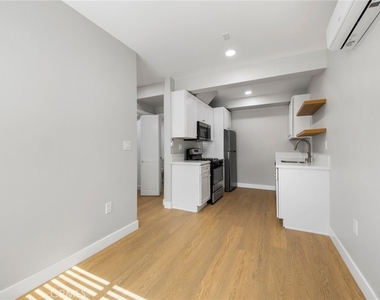1107 E 3rd Unit #9 - Photo Thumbnail 4