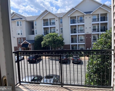 1601 Spring Gate Drive - Photo Thumbnail 1