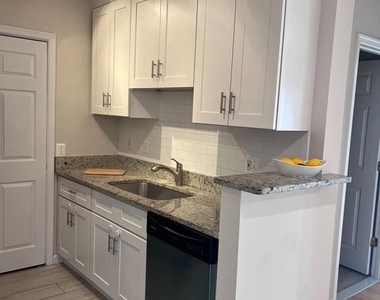 1601 Spring Gate Drive - Photo Thumbnail 3