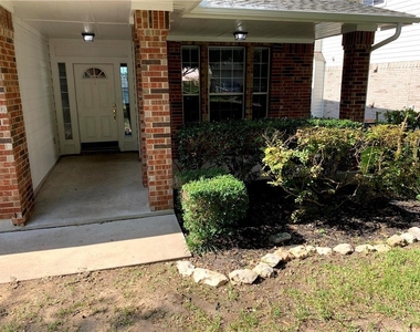 10705 Beard Ave - Photo Thumbnail 2