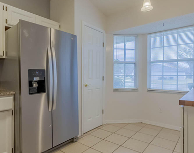 7760 W Allspice Circle - Photo Thumbnail 9