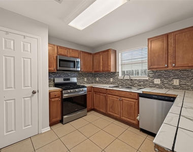 6619 Wellington Meadows Drive - Photo Thumbnail 16