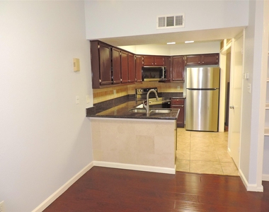 10555 Turtlewood Court - Photo Thumbnail 3