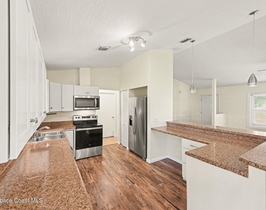 1242 Laconia Street - Photo Thumbnail 6