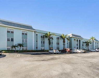 1706 Belleair Forest Drive - Photo Thumbnail 1