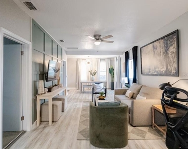 8311 N Newport Avenue - Photo Thumbnail 1