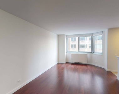 401 E 34th St - Photo Thumbnail 1