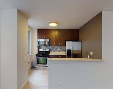 401 E 34th St - Photo Thumbnail 3