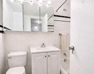 E 39th St - Photo Thumbnail 2