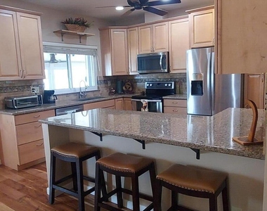14909 W Alpaca Drive - Photo Thumbnail 4