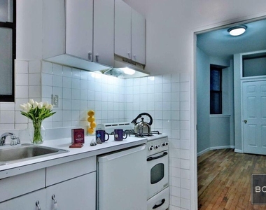 112 East 7th Street - Photo Thumbnail 2