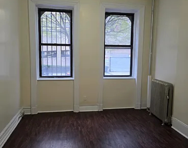 309 W 11TH ST - Photo Thumbnail 1
