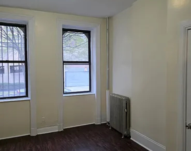 309 W 11TH ST - Photo Thumbnail 2