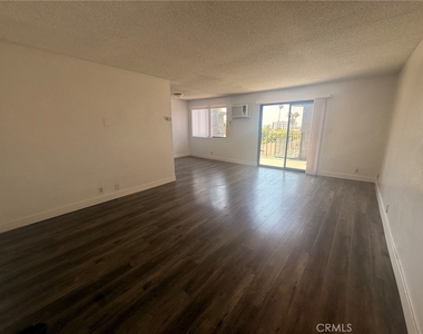 1420 N Mansfield - Photo Thumbnail 3
