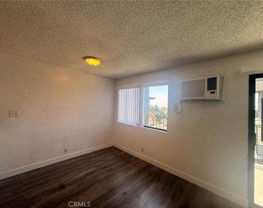 1420 N Mansfield - Photo Thumbnail 4