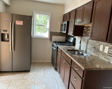410 Herricks Road - Photo Thumbnail 3