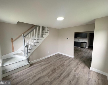 825 W 3rd Street - Photo Thumbnail 2