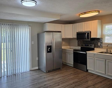8313 Gibbons Drive - Photo Thumbnail 2