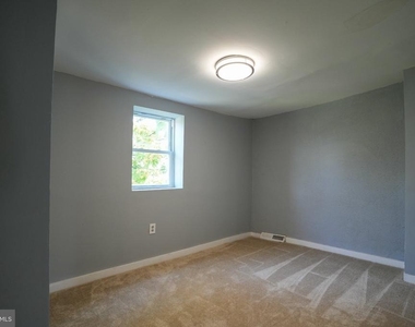 1603 E Lanvale Street - Photo Thumbnail 2