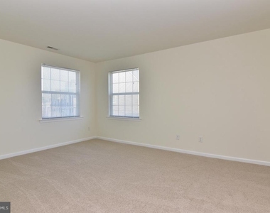 1306 Caitlins Way - Photo Thumbnail 16