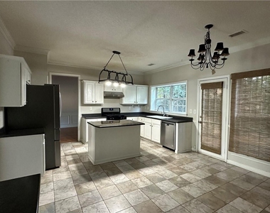7235 Treyburn Drive - Photo Thumbnail 2