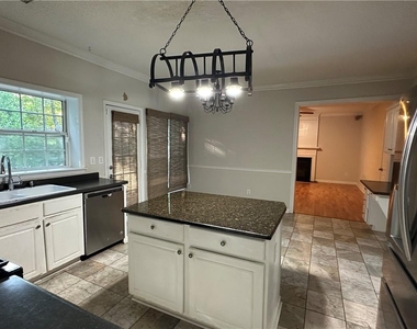 7235 Treyburn Drive - Photo Thumbnail 3