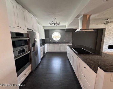 1208 E River Drive - Photo Thumbnail 2