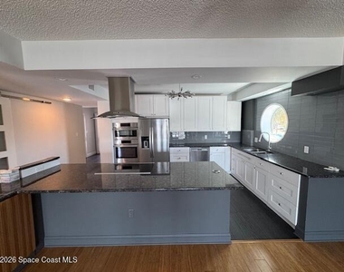 1208 E River Drive - Photo Thumbnail 3
