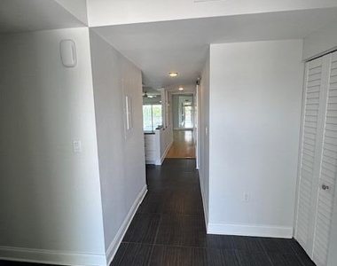 1208 E River Drive - Photo Thumbnail 1
