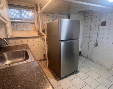 75-15 97 Avenue - Photo Thumbnail 1