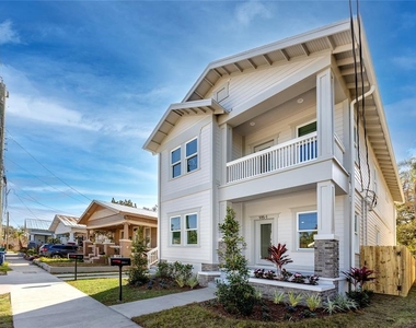 915 E 15th Avenue - Photo Thumbnail 1