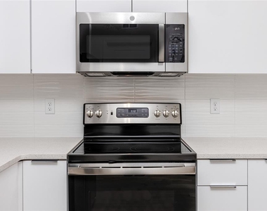 915 E 15th Avenue - Photo Thumbnail 17