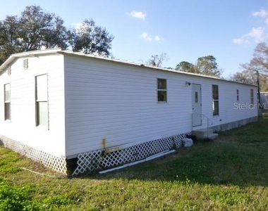 6616 Mangrove Drive - Photo Thumbnail 3