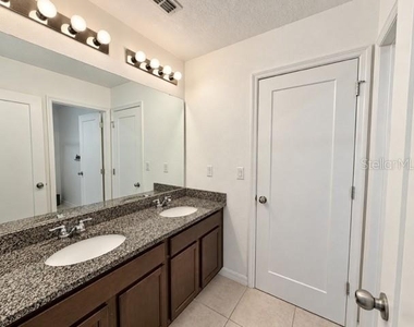 2436 Blowing Breeze Avenue - Photo Thumbnail 20