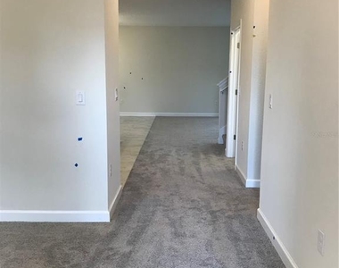 11124 Longleaf Woods Drive - Photo Thumbnail 2
