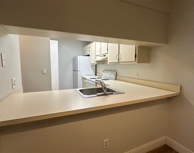 6126 Curry Ford Road - Photo Thumbnail 6