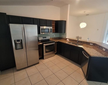 7249 Twin Cedar Lane - Photo Thumbnail 2