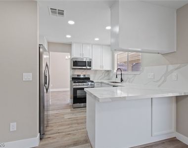 7627 Kalmalii Avenue - Photo Thumbnail 12