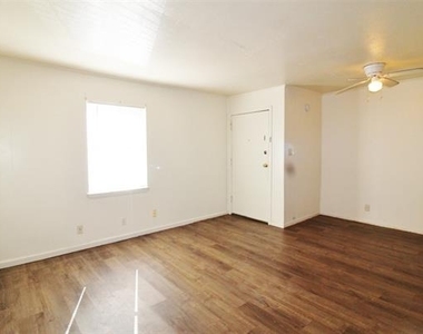 715 E 3rd Street - Photo Thumbnail 1