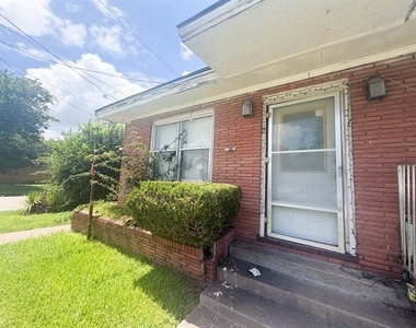 900 E 6th Avenue - Photo Thumbnail 1