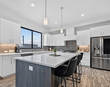 410 Melba Street - Photo Thumbnail 1