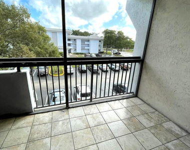 711 N Pine Island Road - Photo Thumbnail 16