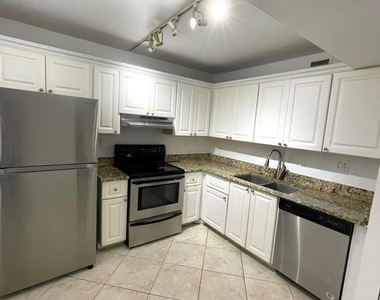 711 N Pine Island Road - Photo Thumbnail 7