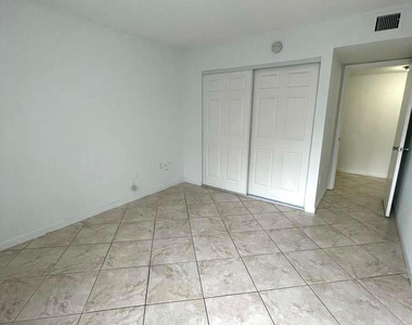711 N Pine Island Road - Photo Thumbnail 14