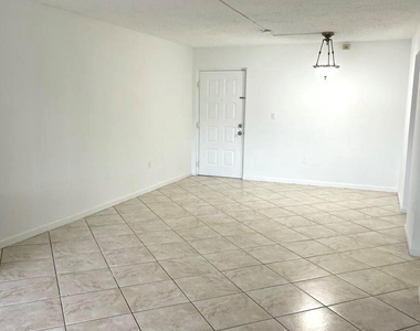 711 N Pine Island Road - Photo Thumbnail 5