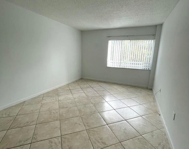 711 N Pine Island Road - Photo Thumbnail 11