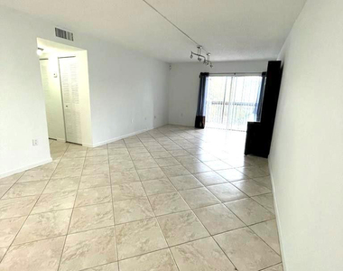 711 N Pine Island Road - Photo Thumbnail 3