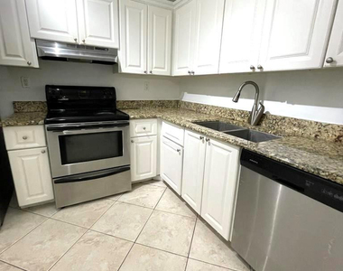 711 N Pine Island Road - Photo Thumbnail 8