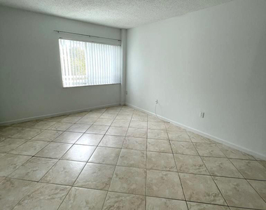711 N Pine Island Road - Photo Thumbnail 10